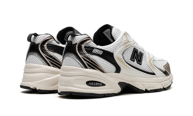 New Balance 530 White Gold Black Sneakers