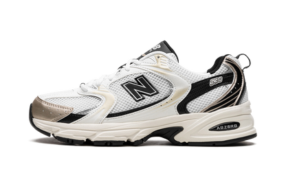 New Balance 530 White Gold Black Sneakers