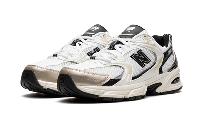New Balance 530 White Gold Black Sneakers